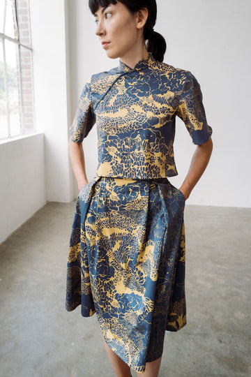 Cheongsam top and flared skirt with pockets