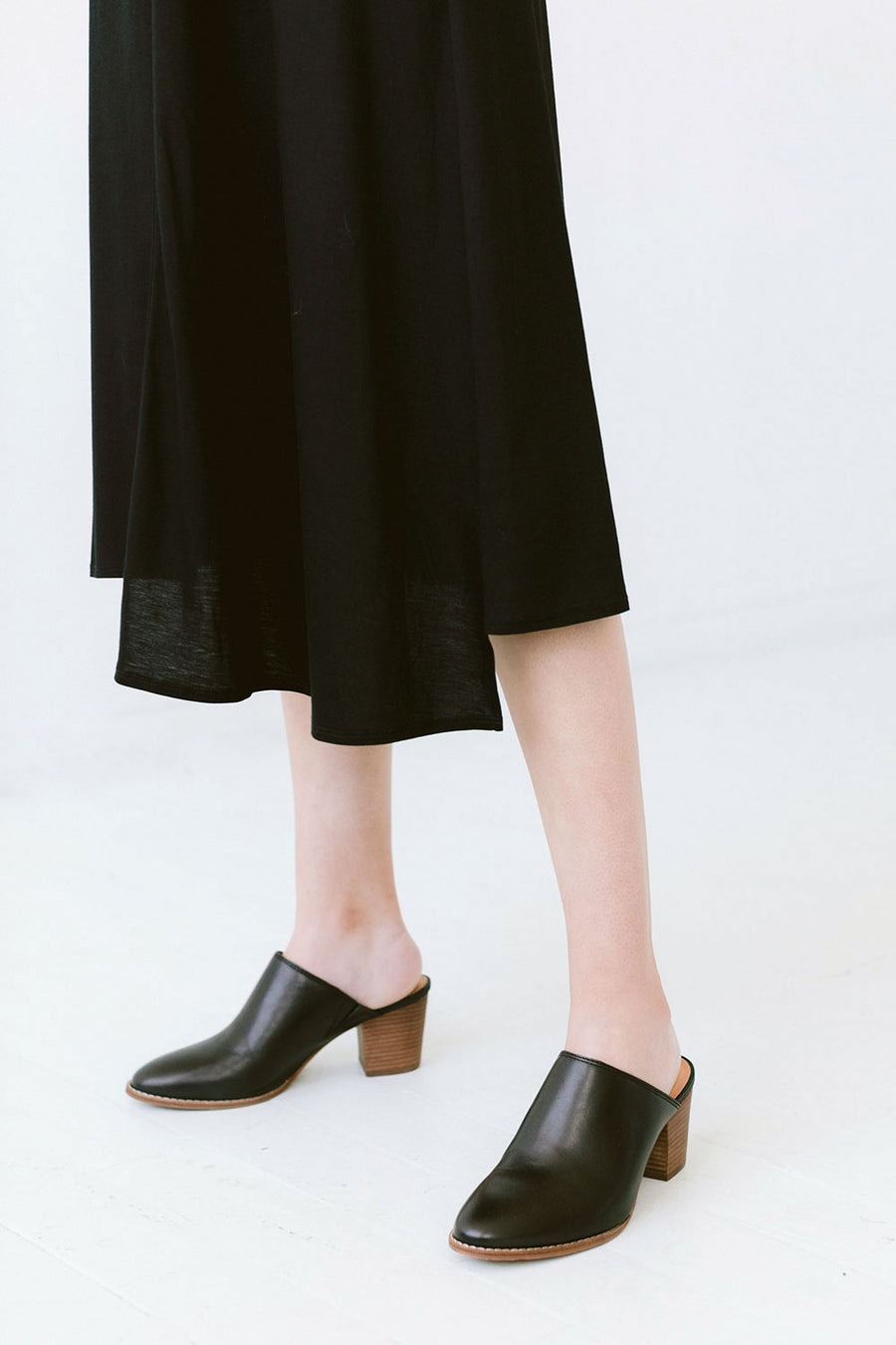 asymmetrical hem black dress