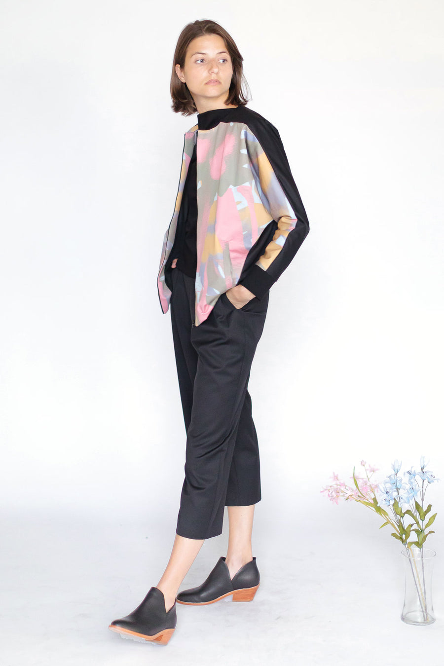 Bomber jacket with black and pink abstract print 
